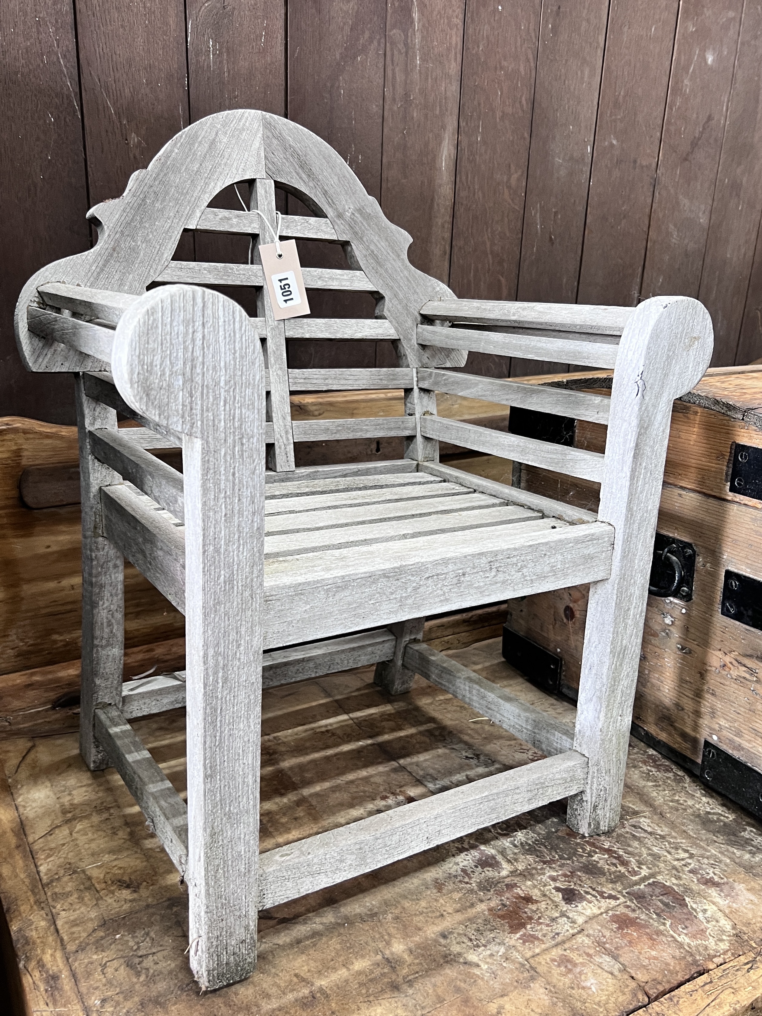 A Lutyens style weathered teak child's garden chair, width 48cm, depth 32cm, height 62cm